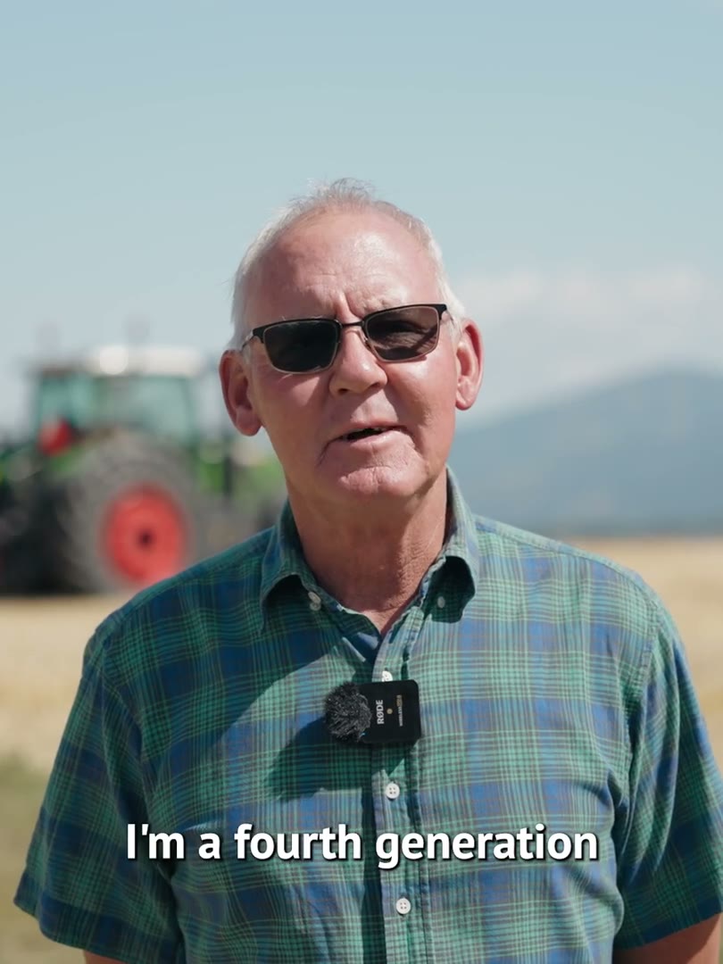 Fourth-generation farmer-rancher Walt Sales talking beside a green tractor, subtitle reading I'm a fourth generation